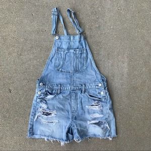 AEO distressed peekaboo pocket Jean shortalls